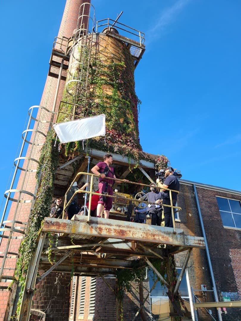 Behind the scenes photo 4 from Clone Cops production showing cinematographer corey allen filming a scene with ted welch